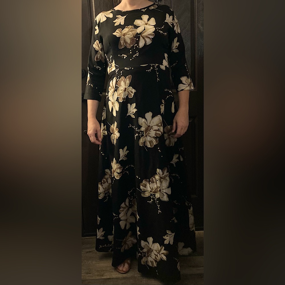 Woman’s black floral dress